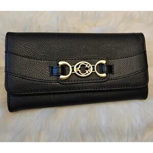 C. Wonder Black Flap Clutch Wallet